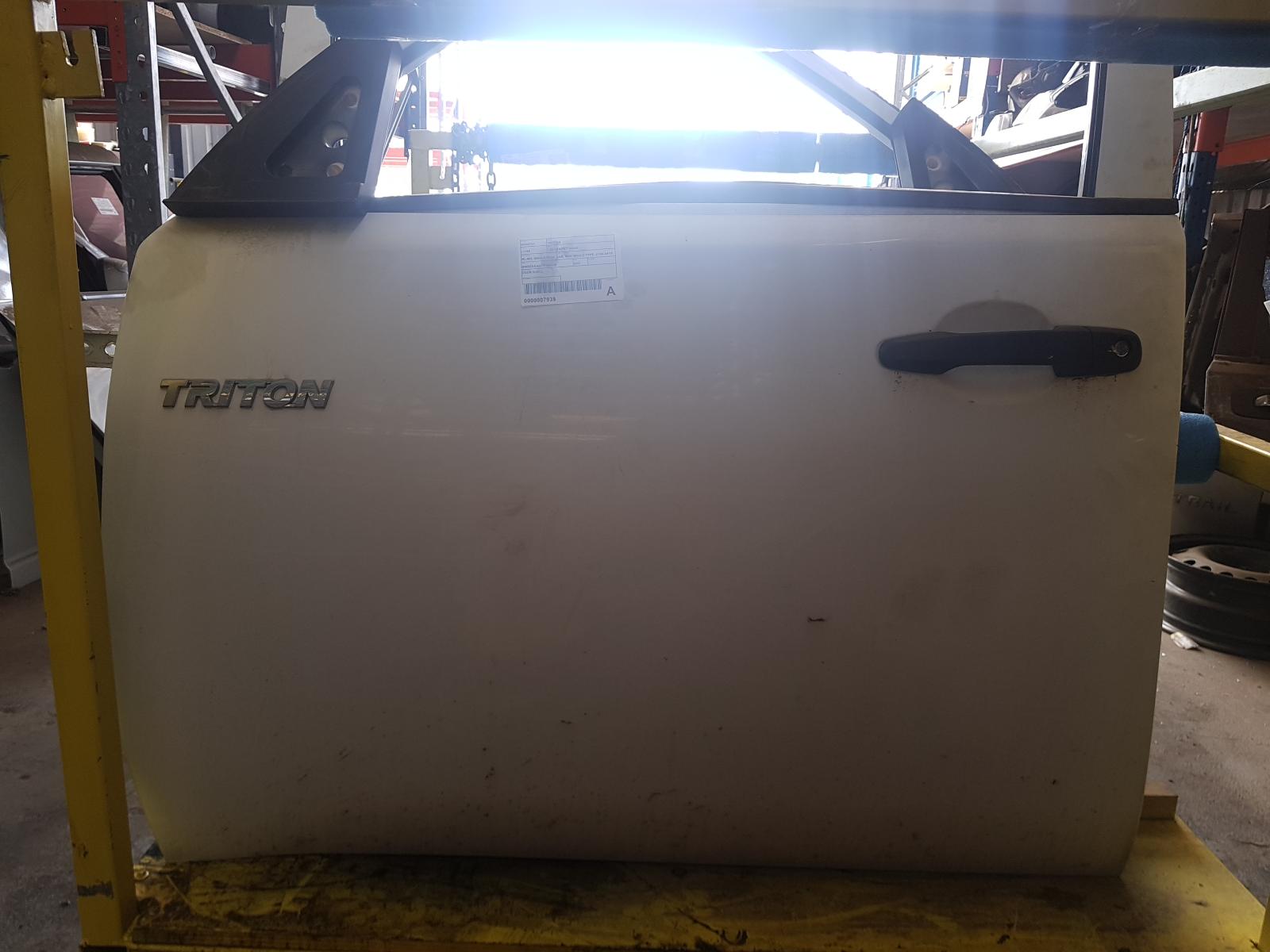 View Auto part Left Front Door Mitsubishi Triton 2007